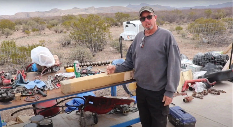 Man rebuilding an engine using ATL Diesel parts available in South Chillicothe, TX